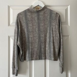 Animal print turtleneck top
